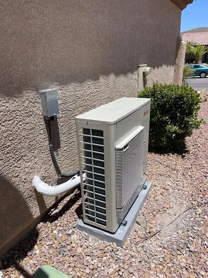 Residential air conditioning condenser unit in El Reno